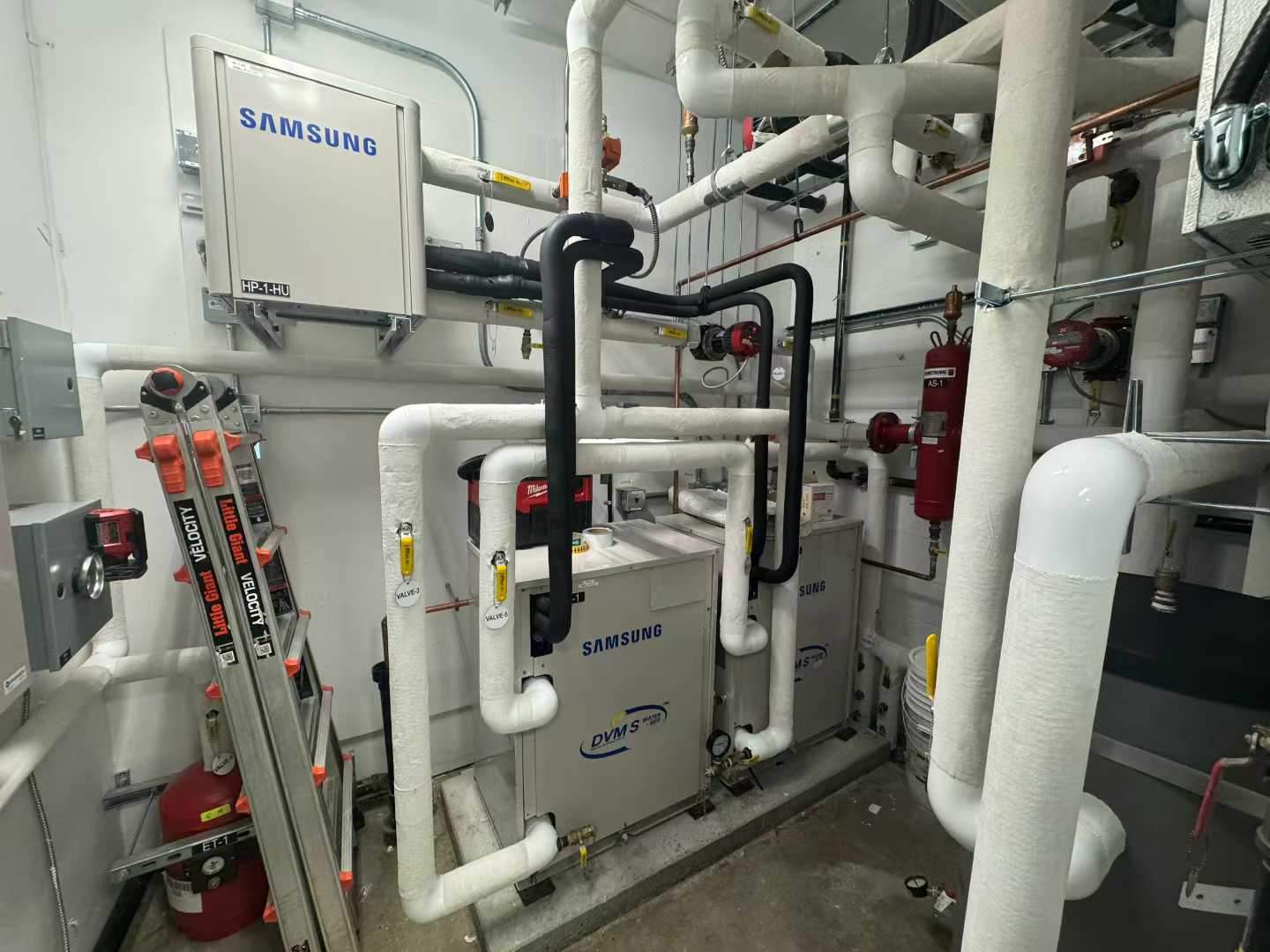 Mechanical room geothermal HVAC system at Richmond Hamilton Fire Hall